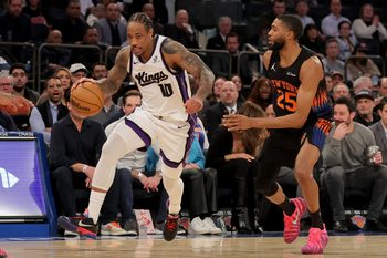 Jan 27, 2026; New York, New York, USA; Sacramento Kings guard DeMar DeRozan (10) brings the ball up court against New York Knicks guard Mikal Bridges (25) during the fourth quarter at Madison Square Garden. Mandatory Credit: Brad Penner-Imagn Images