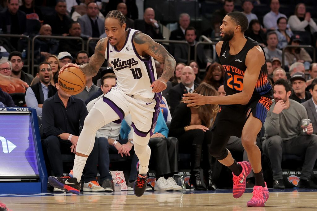Jan 27, 2026; New York, New York, USA; Sacramento Kings guard DeMar DeRozan (10) brings the ball up court against New York Knicks guard Mikal Bridges (25) during the fourth quarter at Madison Square Garden. Mandatory Credit: Brad Penner-Imagn Images