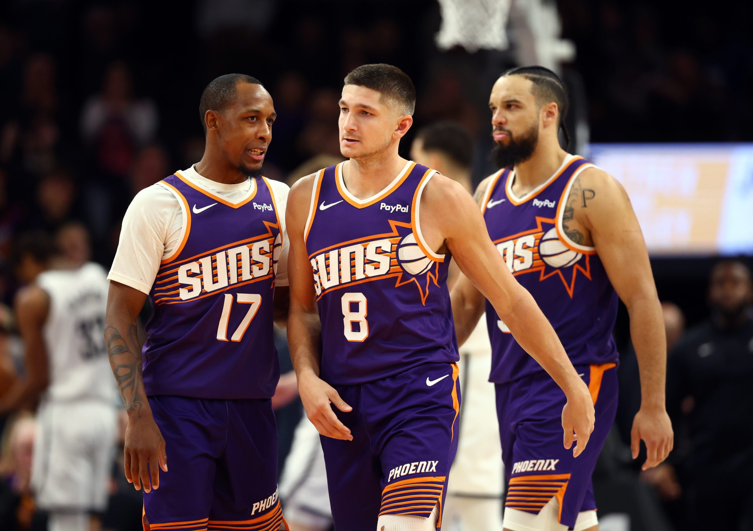 Jan 27, 2026; Phoenix, Arizona, USA; Phoenix Suns guard Grayson Allen (8) with Jamaree Bouyea (17) and Dillon Brooks against the Brooklyn Nets in the second half at Mortgage Matchup Center. Mandatory Credit: Mark J. Rebilas-Imagn Images
