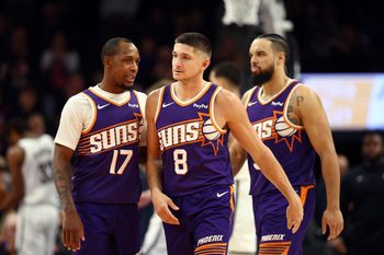 Jan 27, 2026; Phoenix, Arizona, USA; Phoenix Suns guard Grayson Allen (8) with Jamaree Bouyea (17) and Dillon Brooks against the Brooklyn Nets in the second half at Mortgage Matchup Center. Mandatory Credit: Mark J. Rebilas-Imagn Images
