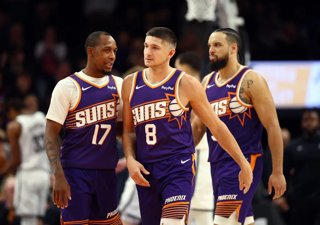 Jan 27, 2026; Phoenix, Arizona, USA; Phoenix Suns guard Grayson Allen (8) with Jamaree Bouyea (17) and Dillon Brooks against the Brooklyn Nets in the second half at Mortgage Matchup Center. Mandatory Credit: Mark J. Rebilas-Imagn Images