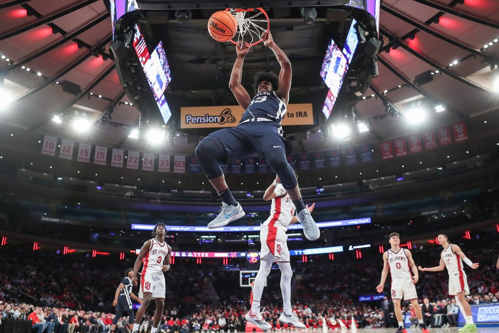Jan 28, 2026; New York, New York, USA; Butler Bulldogs guard Ethan McComb (3) dunks in the second half against the St. John's Red Storm at Madison Square Garden. Mandatory Credit: Wendell Cruz-Imagn Images