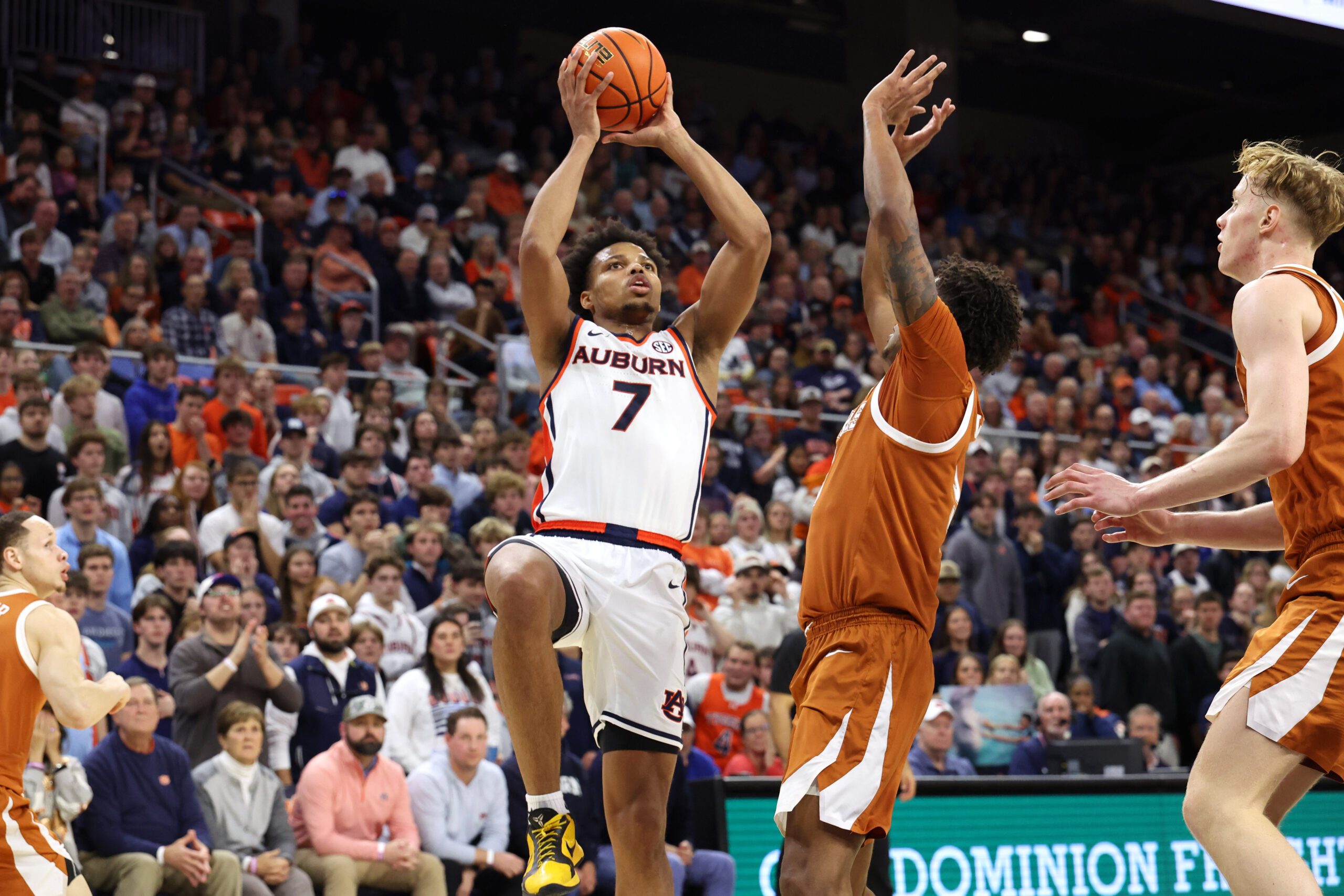 Jan 28, 2026; Auburn, Alabama, USA;  Auburn Tigers guard Keyshawn Hall (7) goes up for a shot against the Texas Longhorns during the second half at Neville Arena. Mandatory Credit: John Reed-Imagn Images