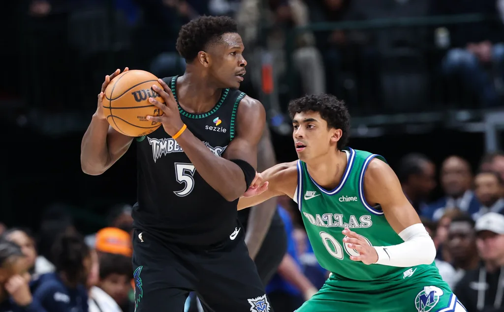 Jan 28, 2026; Dallas, Texas, USA; Minnesota Timberwolves guard Anthony Edwards (5) looks to score as Dallas Mavericks guard Max Christie (00) defends during the second half at American Airlines Center. Mandatory Credit: Kevin Jairaj-Imagn Images