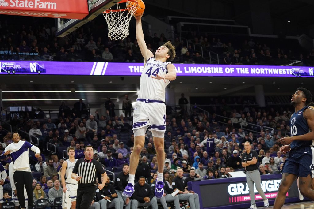 Jan 29, 2026; Evanston, Illinois, USA; Northwestern Wildcats guard Angelo Ciaravino (44) goes up for a dunk against the Penn State Nittany Lions during the second half at Welsh-Ryan Arena. Mandatory Credit: David Banks-Imagn Images