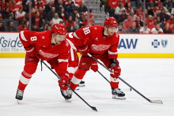 Jan 29, 2026; Detroit, Michigan, USA;  Detroit Red Wings defenseman Ben Chiarot (8) and right wing Patrick Kane (88) gets set during a face off in the third period against the Washington Capitals at Little Caesars Arena. Mandatory Credit: Rick Osentoski-Imagn Images