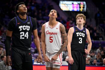 Jan 28, 2026; Fort Worth, Texas, USA; TCU Horned Frogs forward Xavier Edmonds (24) and guard Liutauras Lelevicius (3) and Houston Cougars forward Chris Cenac Jr. (5) look on during the game at Ed and Rae Schollmaier Arena. Mandatory Credit: Jerome Miron-Imagn Images