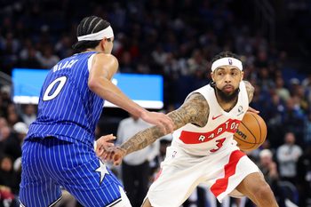 Jan 30, 2026; Orlando, Florida, USA; Toronto Raptors forward Brandon Ingram (3) is guarded by Orlando Magic guard Anthony Black (0) in the fourth quarter at Kia Center. Mandatory Credit: Nathan Ray Seebeck-Imagn Images