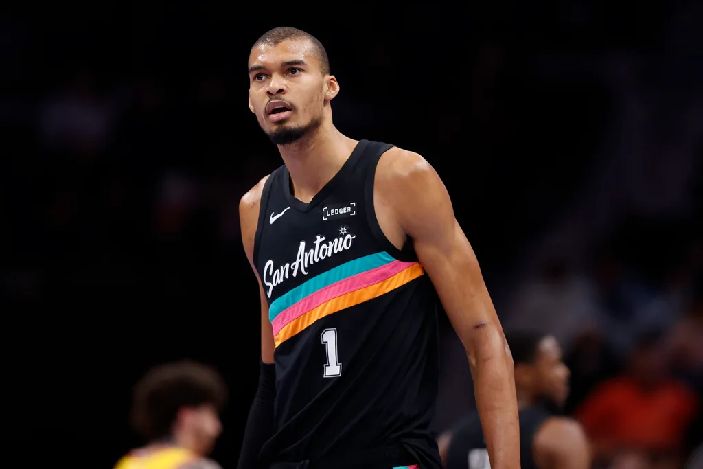 Jan 31, 2026; Charlotte, North Carolina, USA; San Antonio Spurs forward Victor Wembanyama (1) walks down the court during second half action against the Charlotte Hornets at Spectrum Center. Mandatory Credit: Brian Westerholt-Imagn Images
