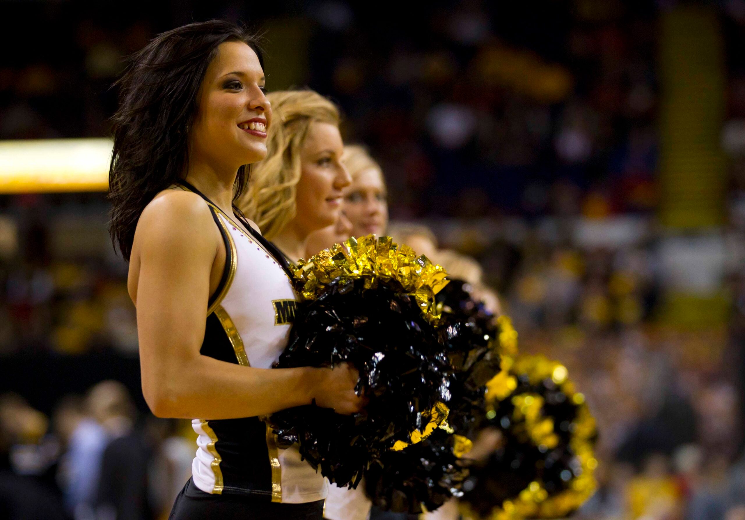 Dec 13, 2011; Milwaukee, WI, USA; Milwaukee Panthers cheerleaders perform during the game against the Wisconsin Badgers at the US Cellular Arena.  Wisconsin defeated Milwaukee 60-54.  Mandatory Credit: Jeff Hanisch-Imagn Images