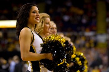 Dec 13, 2011; Milwaukee, WI, USA; Milwaukee Panthers cheerleaders perform during the game against the Wisconsin Badgers at the US Cellular Arena.  Wisconsin defeated Milwaukee 60-54.  Mandatory Credit: Jeff Hanisch-Imagn Images