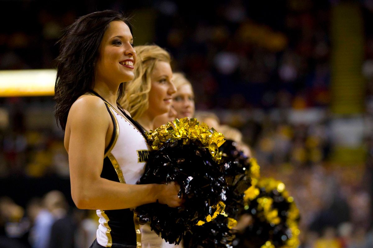 Dec 13, 2011; Milwaukee, WI, USA; Milwaukee Panthers cheerleaders perform during the game against the Wisconsin Badgers at the US Cellular Arena. Wisconsin defeated Milwaukee 60-54. Mandatory Credit: Jeff Hanisch-Imagn Images