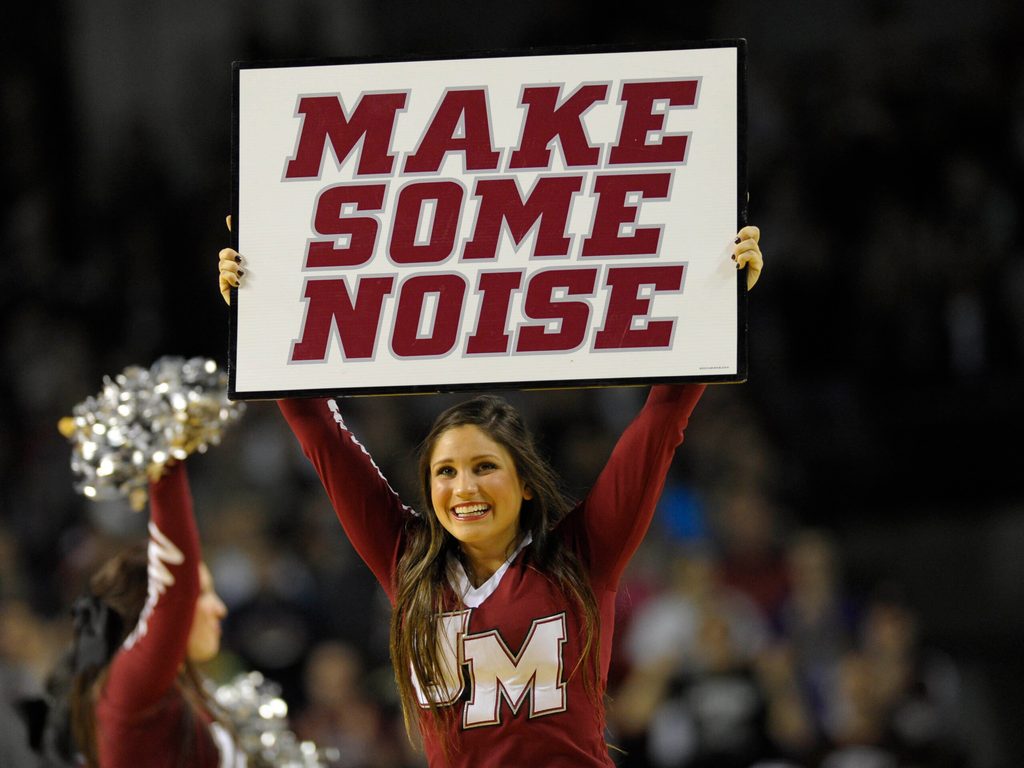Jan 11, 2014; Amherst, MA, USA; The Massachusetts Minutemen cheerleaders perform during a timeout in the second half against the St. Bonaventure Bonnies at Mullins Center. Mandatory Credit: Bob DeChiara-Imagn Images