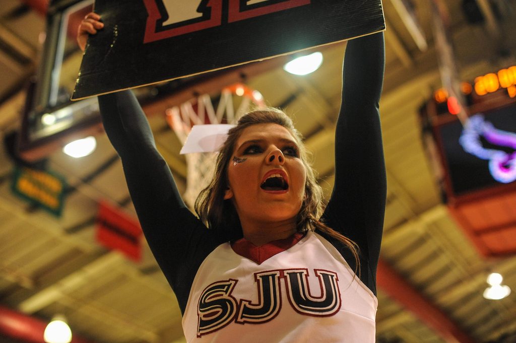 Feb 5, 2014; Philadelphia, PA, USA; A Saint Joseph's Hawks cheerleader during the 1st half of the game against the Saint Louis Billikens at Hagan Arena. Mandatory Credit: John Geliebter-Imagn Images