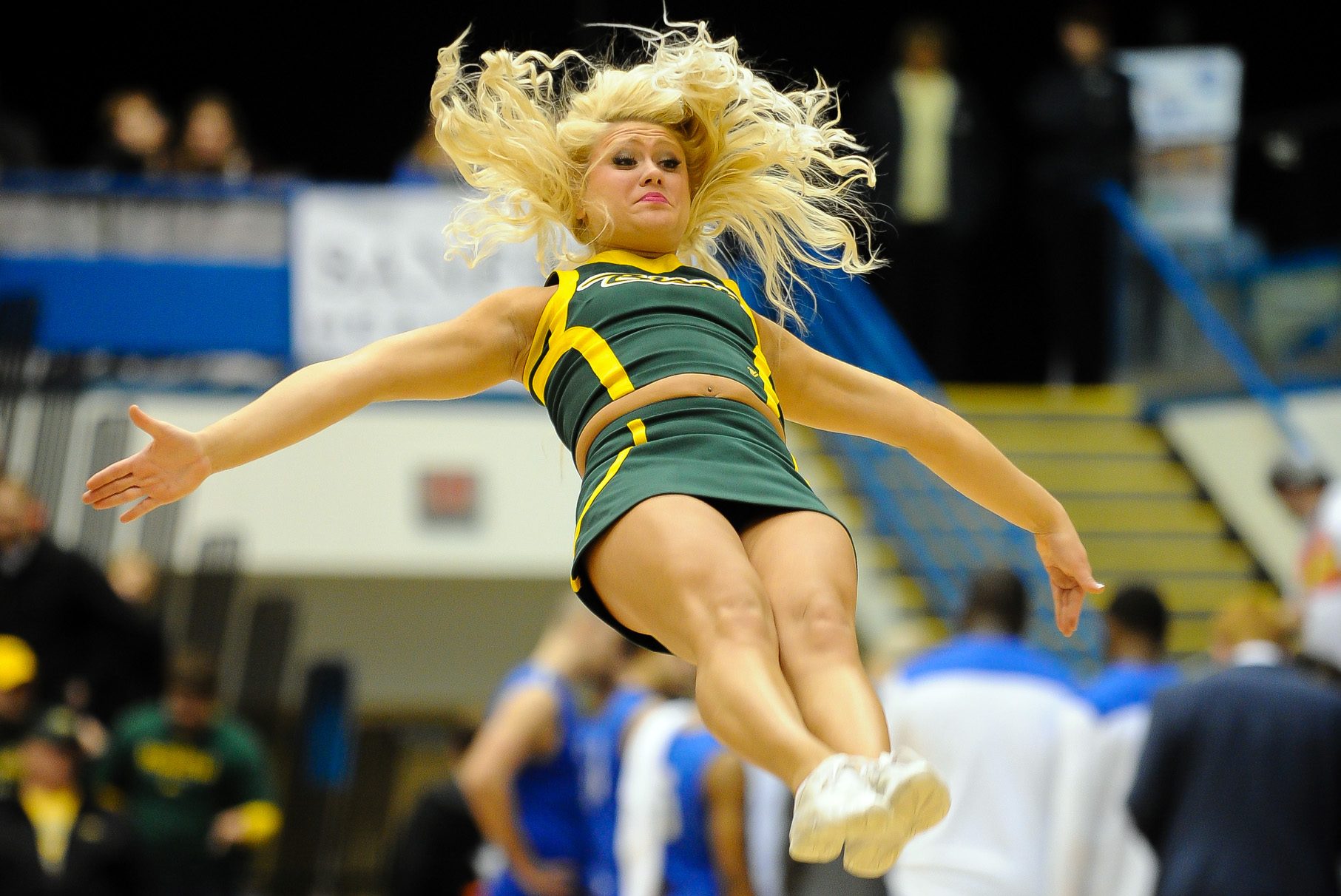Mar 11, 2014; Sioux Falls, SD, USA; A North Dakota State Bisons cheerleader performs during a break against the Fort Wayne Mastodons in the championship game of the Summit Conference tournament at Sioux Falls Sports. North Dakota State defeated Fort Wayne 60-57. Mandatory Credit: Steven Branscombe-Imagn Images