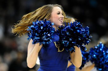 Mar 20, 2014; Spokane, WA, USA; Delaware Fightin Blue Hens cheerleader performs against the Michigan State Spartans in the first half of a men's college basketball game during the second round of the 2014 NCAA Tournament at Veterans Memorial Arena. Mandatory Credit: James Snook-Imagn Images