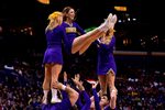 Mar 8, 2015; St. Louis, MO, USA; Northern Iowa Panthers cheerleaders perform during a time out in the game between the Illinois State Redbirds and the Northern Iowa Panthers during the championship game of the Missouri Valley Conference basketball tournament at Scotttrade Center. Mandatory Credit: Jasen Vinlove-Imagn Images