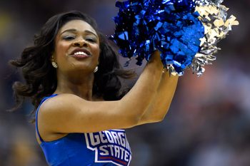 Mar 21, 2015; Jacksonville, FL, USA; A Georgia State Panthers cheerleader performs against the Xavier Musketeers in the second half of a game in the third round of the 2015 NCAA Tournament at Jacksonville Veterans Memorial Arena. Mandatory Credit: John David Mercer-Imagn Images