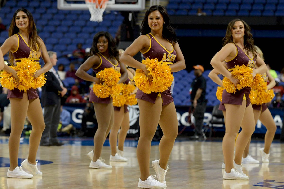 Mar 27, 2015; Greensboro, NC, USA; Arizona State Sun Devils cheerleaders perform during the first half against the Florida State Seminoles in the semifinals of the Greensboro regional in the women's 2015 NCAA Tournament at Greenboro Coliseum Complex. Mandatory Credit: Rob Kinnan-Imagn Images