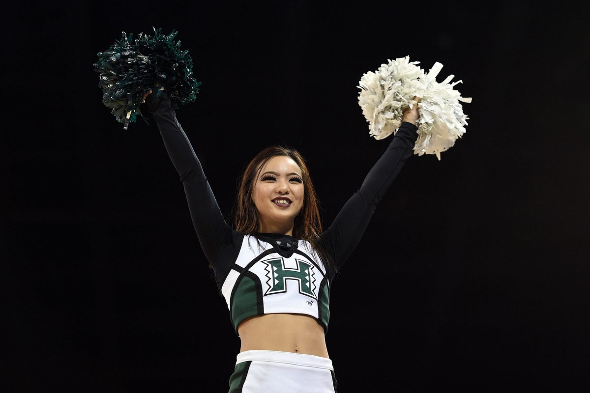March 20, 2016; Spokane , WA, USA; Hawaii Rainbow Warriors cheerleader performs during the second half in the second round of the 2016 NCAA Tournament at Spokane Veterans Memorial Arena. Mandatory Credit: Kyle Terada-Imagn Images
