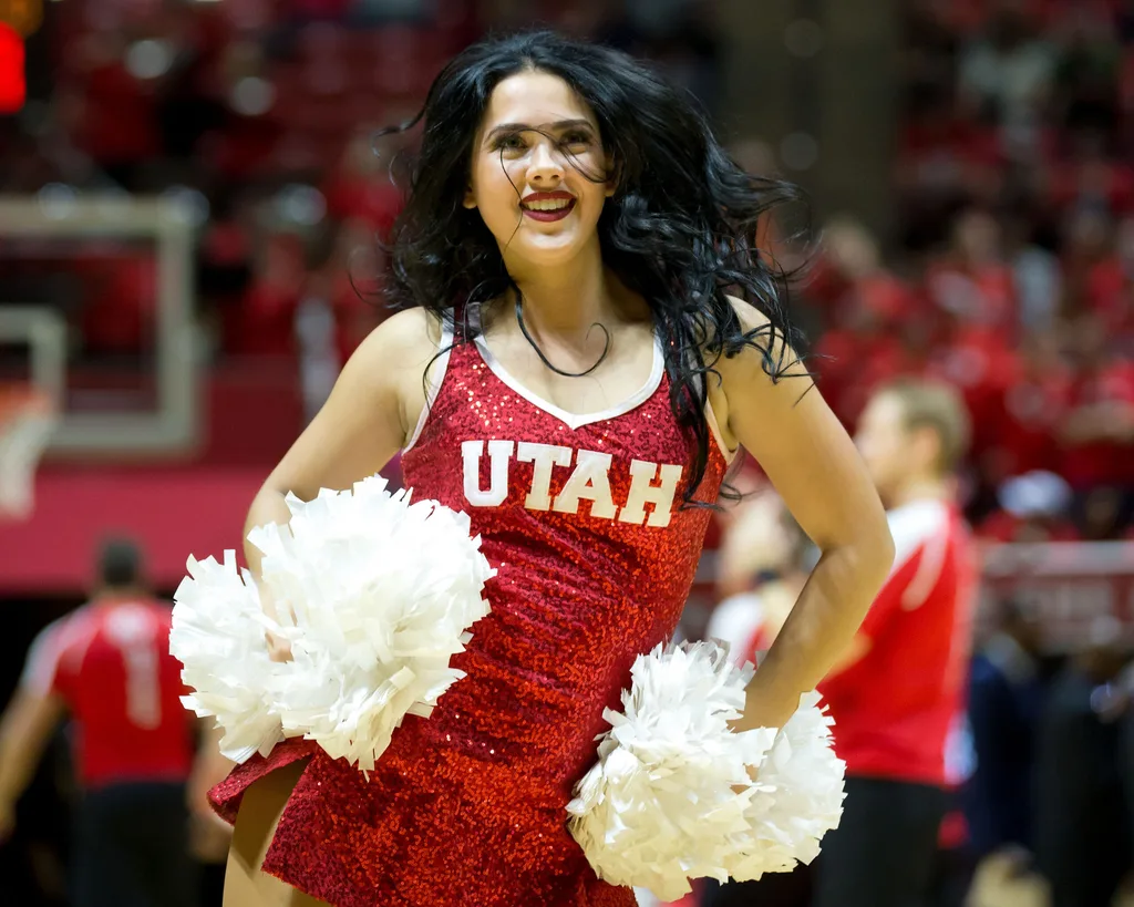 Feb 9, 2017; Salt Lake City, UT, USA; A Utah Utes cheerleader performs during a timeout in the second half against the Washington State Cougars at Jon M. Huntsman Center. Utah won 74-70. Mandatory Credit: Russ Isabella-Imagn Images