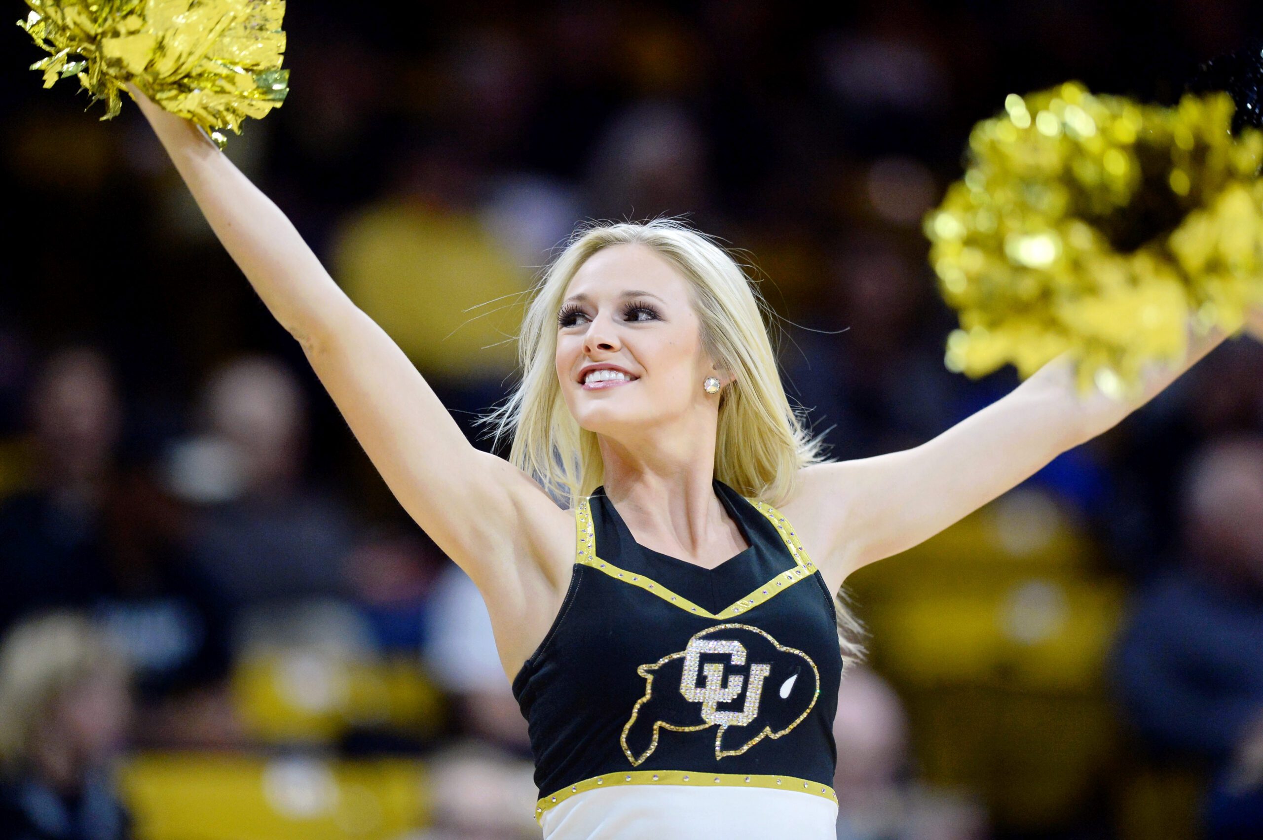 Mar 2, 2017; Boulder, CO, USA; Colorado Buffaloes cheerleader performs in the first half against the Stanford Cardinal at the Coors Events Center. Mandatory Credit: Ron Chenoy-Imagn Images