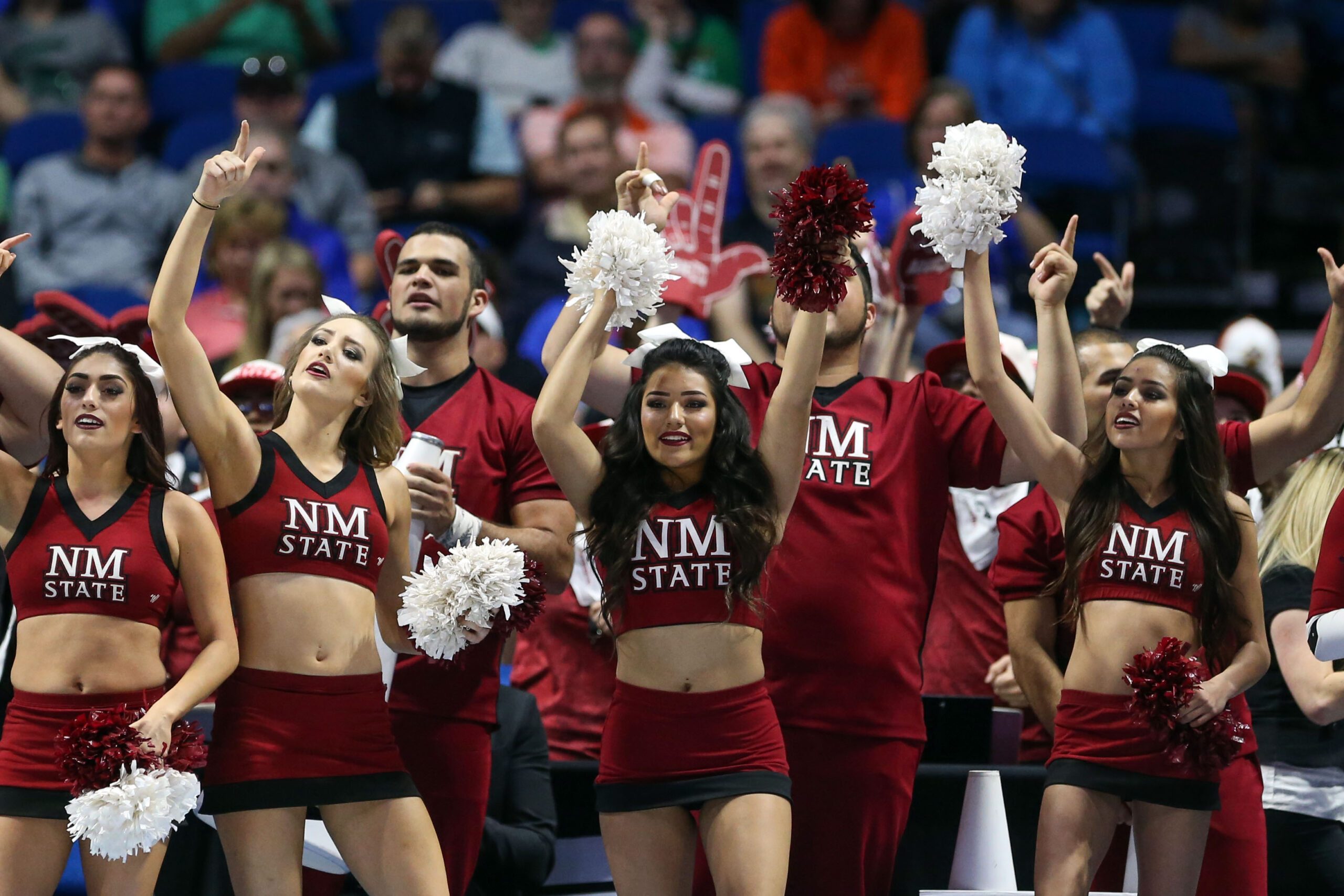 Mar 17, 2017; Tulsa, OK, USA; New Mexico State Aggies cheerleaders perform during the first half against the Baylor Bears in the first round of the 2017 NCAA Tournament at BOK Center. Mandatory Credit: Kevin Jairaj-Imagn Images