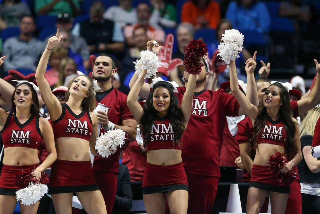 Mar 17, 2017; Tulsa, OK, USA; New Mexico State Aggies cheerleaders perform during the first half against the Baylor Bears in the first round of the 2017 NCAA Tournament at BOK Center. Mandatory Credit: Kevin Jairaj-Imagn Images