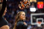 Mar 8, 2018; Kansas City, MO, United States; A Oklahoma State Cowboys cheerleader smiles in the first half against the Kansas Jayhawks during the semifinals of the Big 12 Tournament at Sprint Center. Mandatory Credit: Amy Kontras-Imagn Images