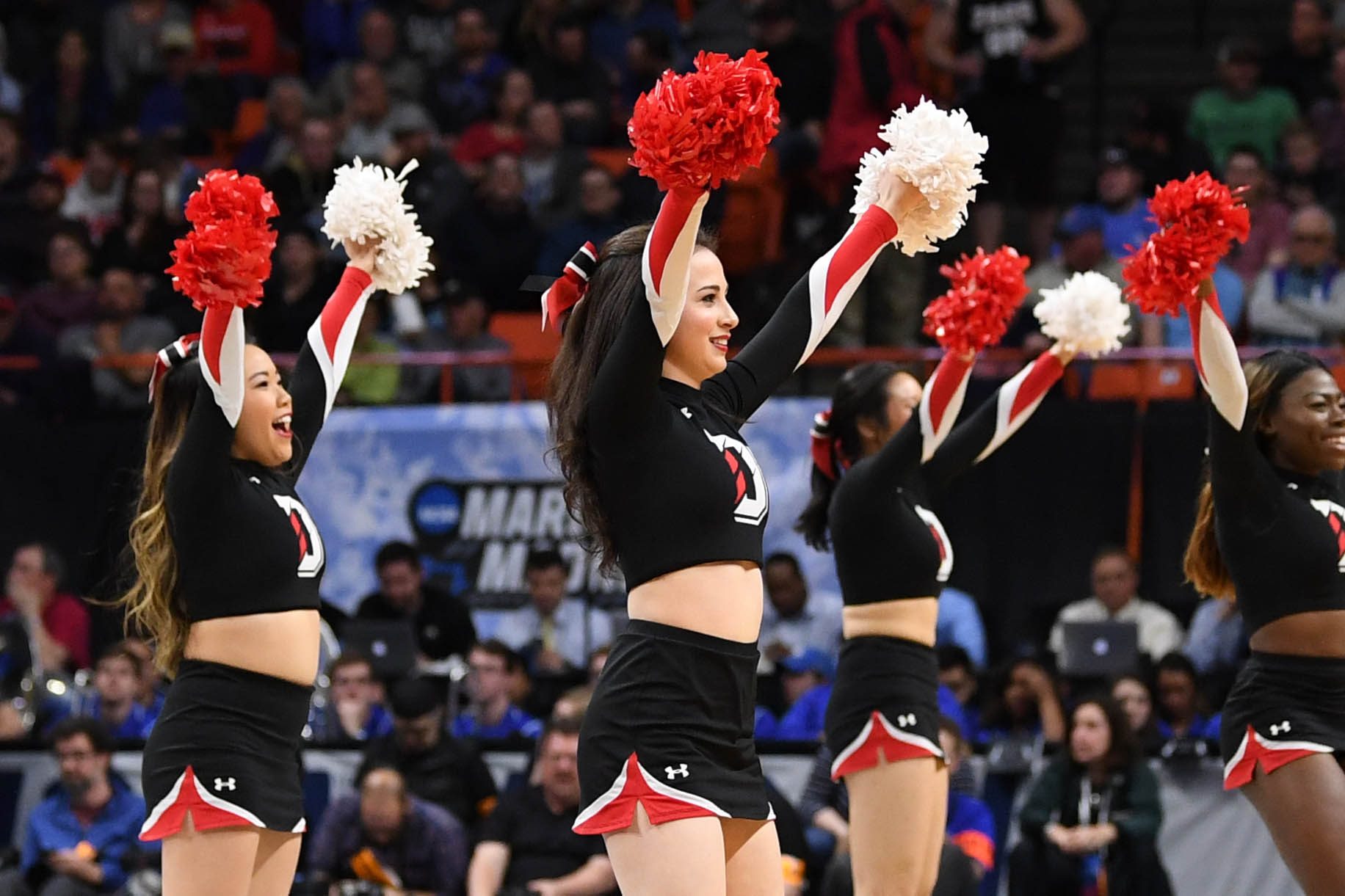 Mar 15, 2018; Boise, ID, USA; Davidson Wildcats cheerleaders perform in the second half against the Kentucky Wildcats during the first round of the 2018 NCAA Tournament at Taco Bell Arena. Mandatory Credit: Kyle Terada-Imagn Images