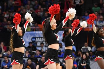 Mar 15, 2018; Boise, ID, USA; Davidson Wildcats cheerleaders perform in the second half against the Kentucky Wildcats during the first round of the 2018 NCAA Tournament at Taco Bell Arena. Mandatory Credit: Kyle Terada-Imagn Images