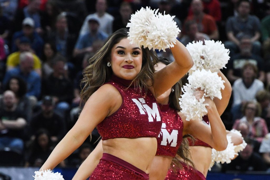 Mar 21, 2019; Salt Lake City, UT, USA; New Mexico State Aggies cheerleaders perform during the first half in the first round of the 2019 NCAA Tournament against the Auburn Tigers at Vivint Smart Home Arena. Mandatory Credit: Kirby Lee-Imagn Images