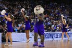 Mar 21, 2019; Jacksonville, FL, USA; The Abilene Christian Wildcats mascot and cheerleaders dance on the court during a stoppage in play against the Kentucky Wildcats the first half against the Kentucky Wildcats in the first round of the 2019 NCAA Tournament at Jacksonville Veterans Memorial Arena. Mandatory Credit: Matt Stamey-Imagn Images