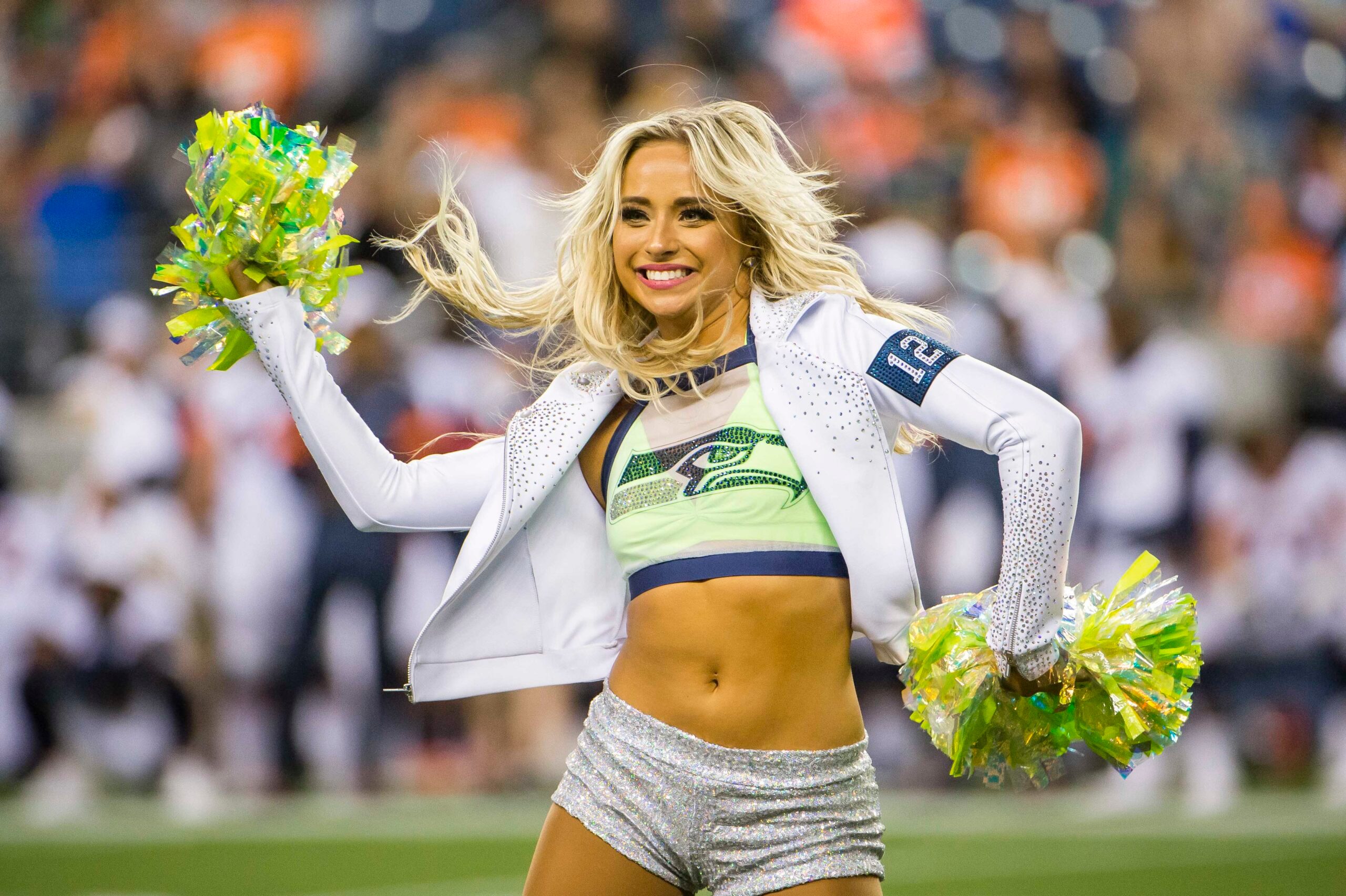 Aug 8, 2019; Seattle, WA, USA; A Seattle Seahawks cheerleader dances during a timeout during the second half against the Denver Broncos at CenturyLink Field. The Seahawks beat the Broncos 22-14. Mandatory Credit: Troy Wayrynen-Imagn Images