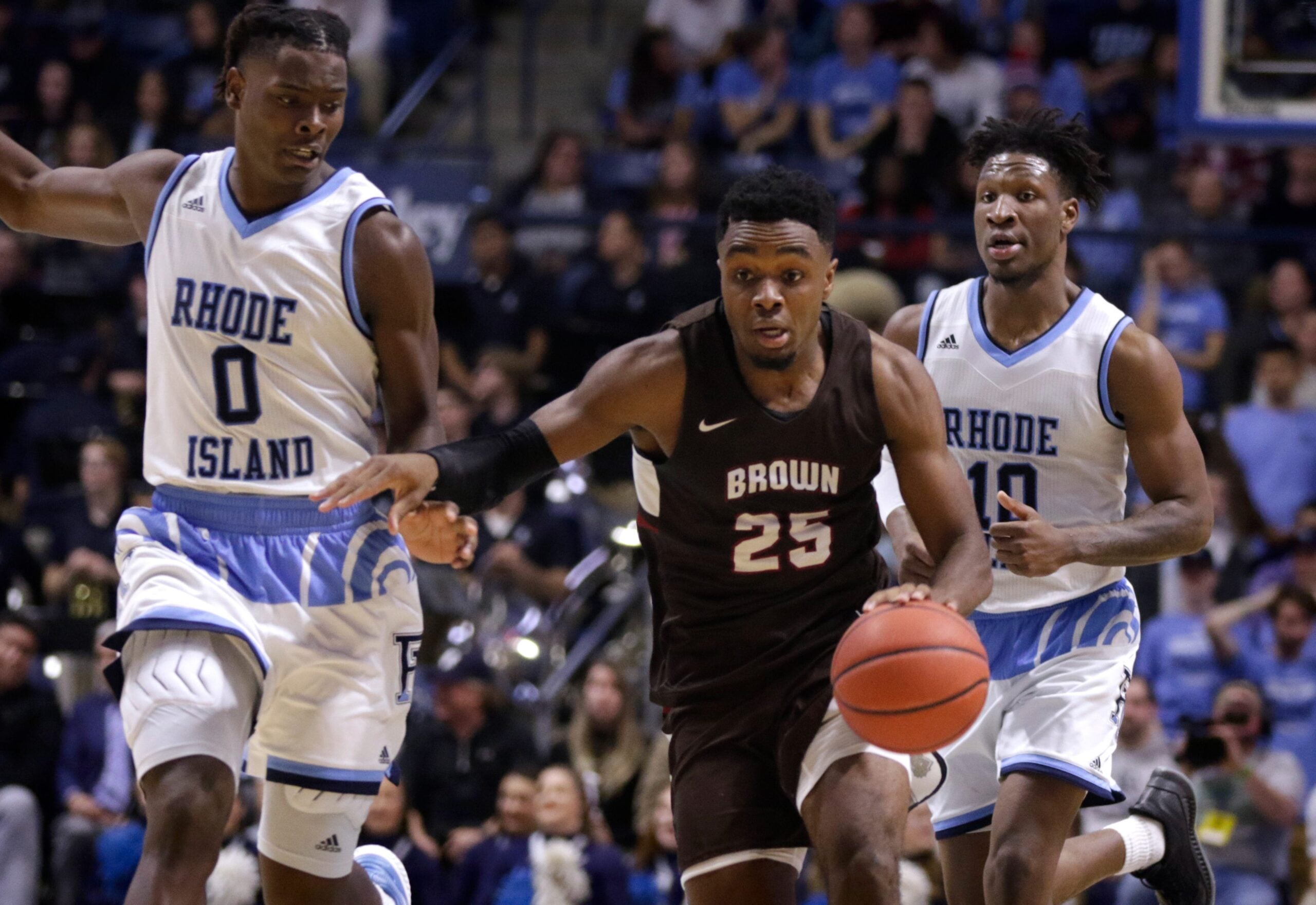 Published Caption:  Brown   s Tamenang Choh leads his team up court during last season   s game against URI. Choh averaged 12.5 points and 9.5 rebounds a game last year as he blossomed into a star for the Bears. [The Providence Journal, file / Kris Craig] Original Caption:  South Kingstown, RI,  Nov 28, 2018 - Bear guard Tamenang Choh sprints through URI defenders Jermaine Harris and Cyril Langevine on a fast break.   Brown University travels to URI to take on the Rams in mens basketball on Wednesday evening at the Ryan Center.   [The Providence Journal / Kris Craig]

Talent Experience Should Help Brown Contend Again