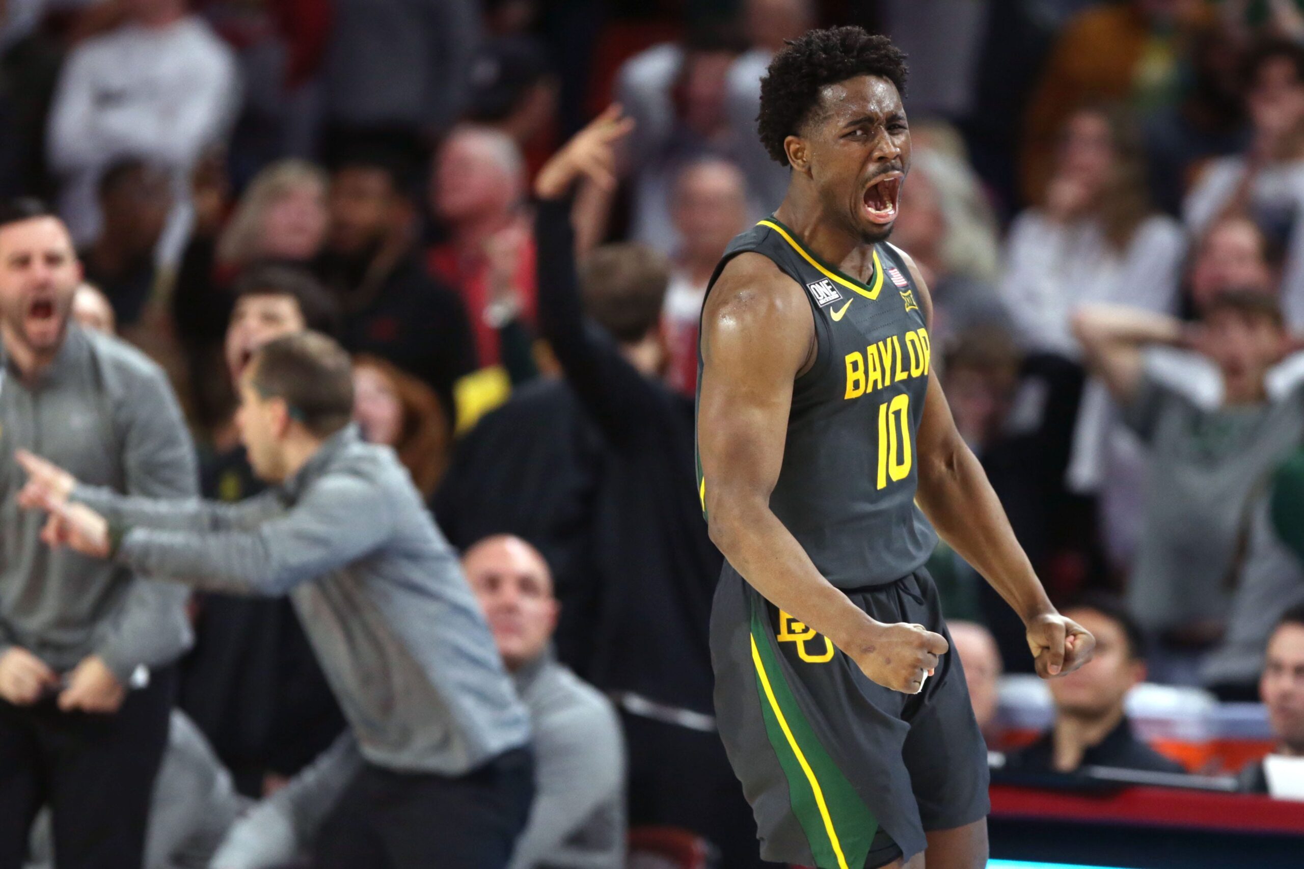 Baylor Bears guard Adam Flagler (10) celebrates after making a 3-pointer late in a men's college basketball game between the University of Oklahoma Sooners (OU) and the Baylor Bears at Lloyd Noble Center in Norman, Okla., Saturday, Jan. 21, 2023. Baylor won 62-60.

ouhoops -- print2