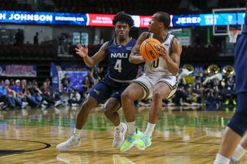 Mar 8, 2023; Boise, ID, USA; Northern Arizona Lumberjacks guard Oakland Fort (4) guards Montana State Bobcats guard Darius Brown II (10) during the first half at Idaho Central Arena. Mandatory Credit: Brian Losness-Imagn Images