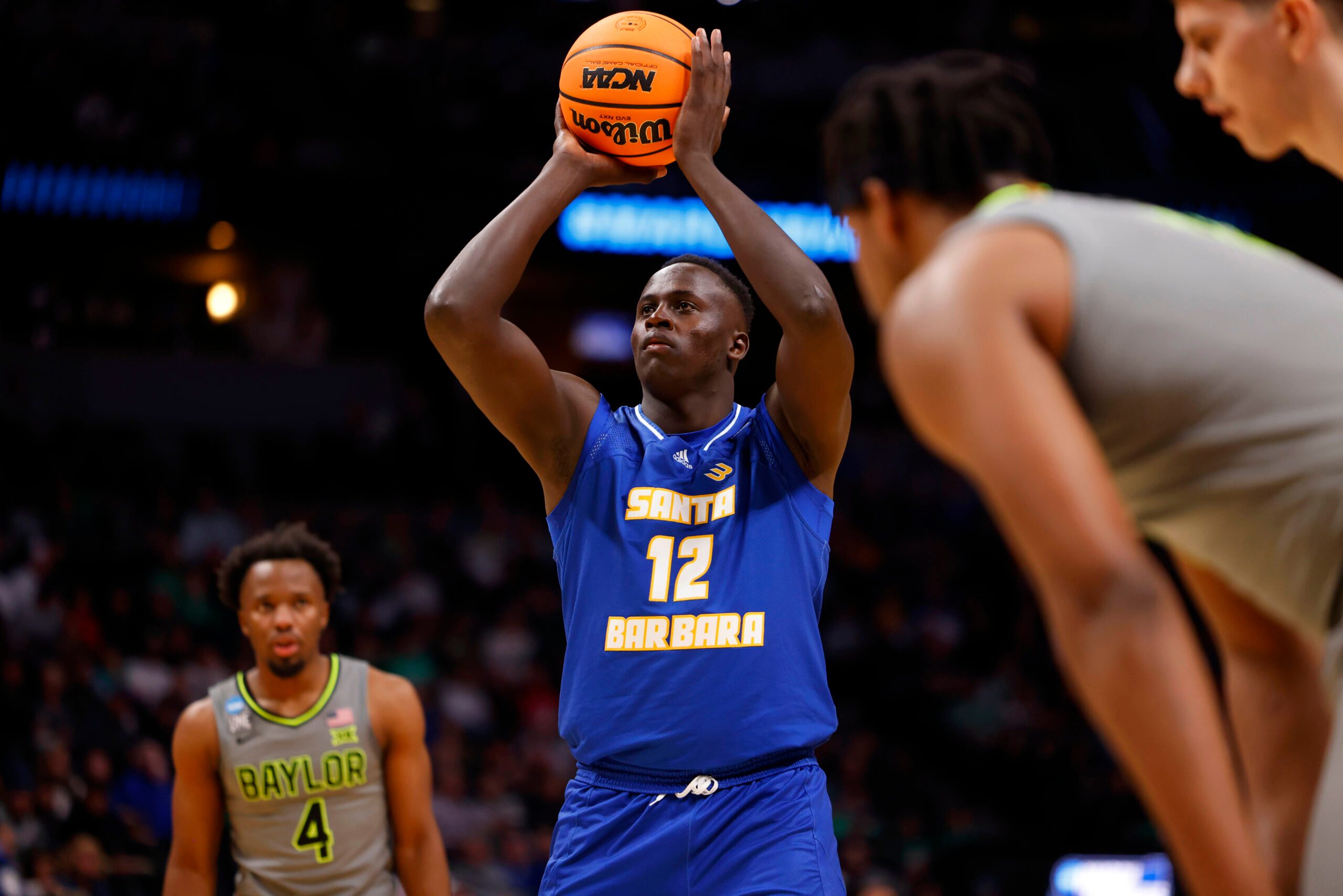 Mar 17, 2023; Denver, CO, USA;  UC Santa Barbara Gauchos forward Evans Kipruto (12) takes a shot at the basket during the first half against Baylor Bears in the first round of the 2023 NCAA men   s basketball tournament at Ball Arena. Mandatory Credit: Michael Ciaglo-Imagn Images