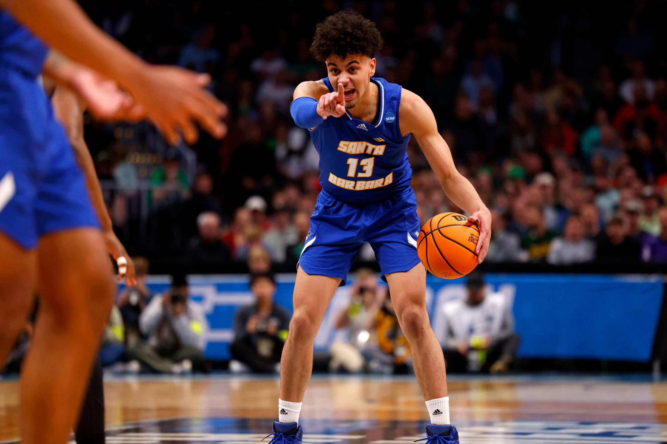 Mar 17, 2023; Denver, CO, USA; UC Santa Barbara Gauchos guard Ajay Mitchell (13) signals to teammates during the first half against Baylor Bears in the first round of the 2023 NCAA men s basketball tournament at Ball Arena. Mandatory Credit: Michael Ciaglo-Imagn Images