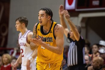 Dec 29, 2023; Bloomington, Indiana, USA; Kennesaw State Owls guard Jusaun Holt (24) celebrates a made basket in the first half against the Indiana Hoosiers at Simon Skjodt Assembly Hall. Mandatory Credit: Trevor Ruszkowski-Imagn Images