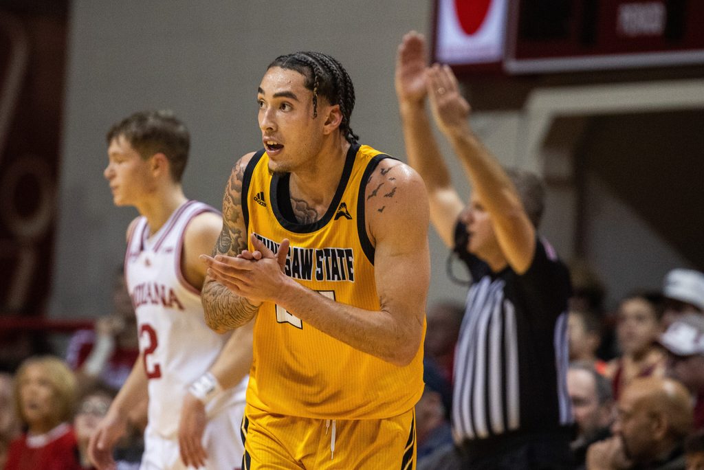 Dec 29, 2023; Bloomington, Indiana, USA; Kennesaw State Owls guard Jusaun Holt (24) celebrates a made basket in the first half against the Indiana Hoosiers at Simon Skjodt Assembly Hall. Mandatory Credit: Trevor Ruszkowski-Imagn Images