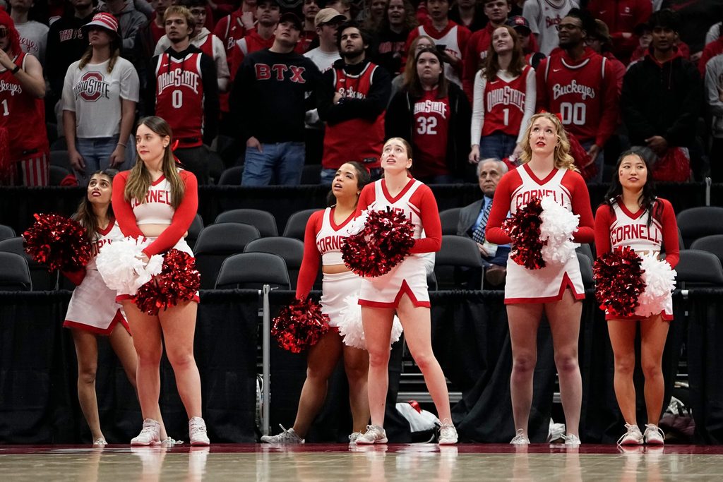 Mar 19, 2024; Columbus, OH, USA; Cornell Big Red cheerleaders react during the second half of the NIT basketball game against the Ohio State Buckeyes at Value City Arena. Ohio State won 88-83.