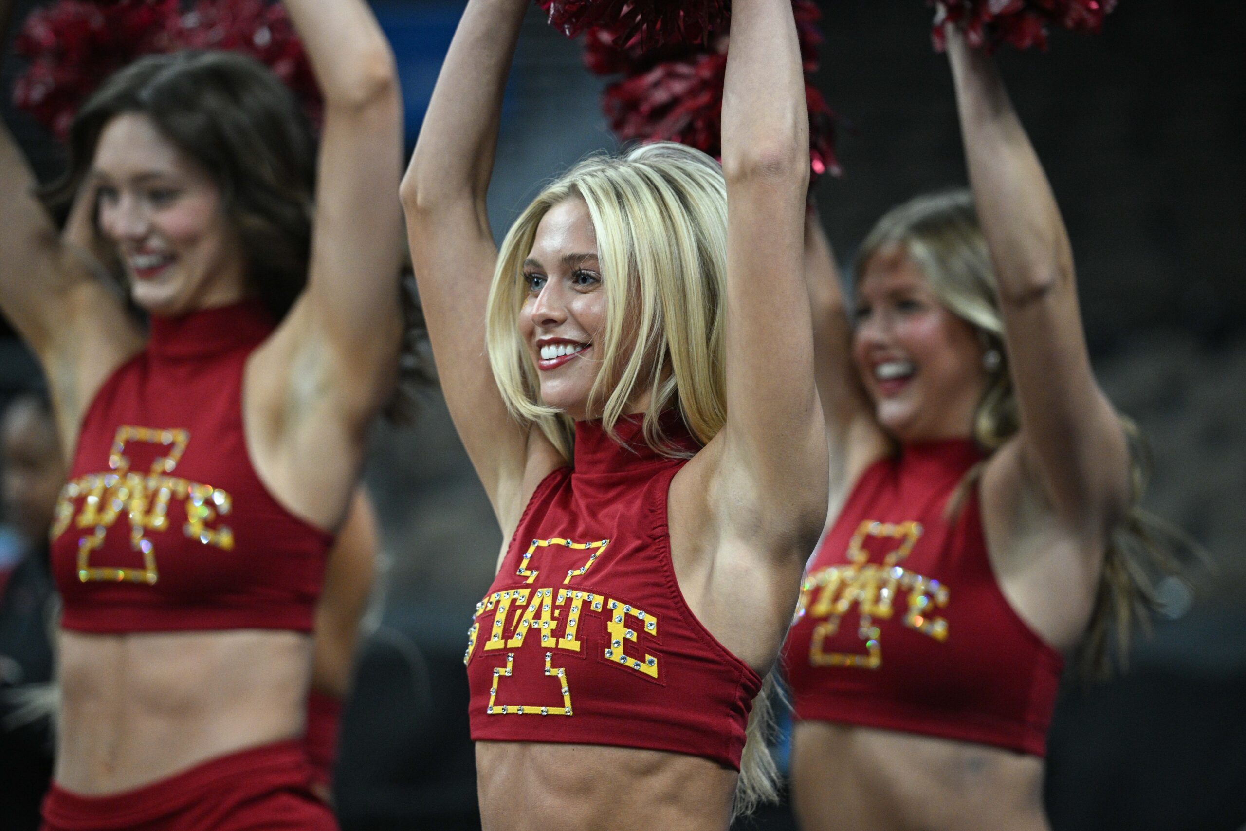 Mar 20, 2024; Omaha, NE, USA;  Iowa State Cyclones cheerleaders perform during the NCAA first round practice session at CHI Health Center Omaha. Mandatory Credit: Steven Branscombe-Imagn Images