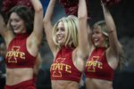 Mar 20, 2024; Omaha, NE, USA;  Iowa State Cyclones cheerleaders perform during the NCAA first round practice session at CHI Health Center Omaha. Mandatory Credit: Steven Branscombe-Imagn Images