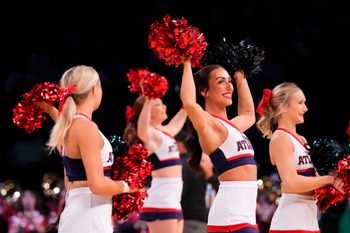 March 22, 2024, Brooklyn, NY, USA; Florida Atlantic Owls cheerleaders perform against the Northwestern Wildcats in the first round of the 2024 NCAA Tournament at the Barclays Center. Mandatory Credit: Robert Deutsch-Imagn Images