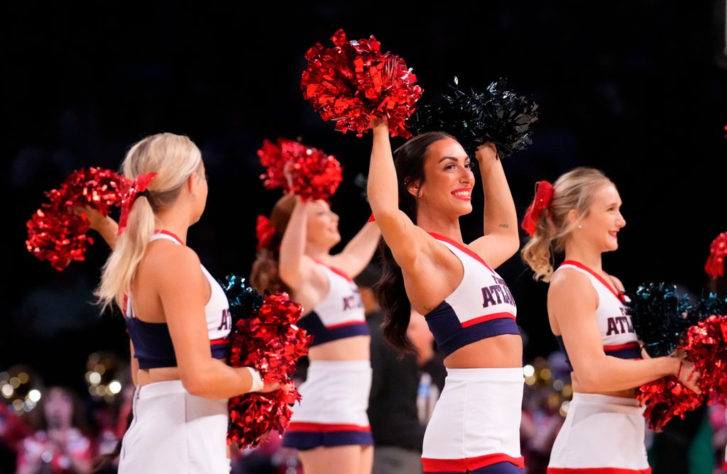 March 22, 2024, Brooklyn, NY, USA; Florida Atlantic Owls cheerleaders perform against the Northwestern Wildcats in the first round of the 2024 NCAA Tournament at the Barclays Center. Mandatory Credit: Robert Deutsch-Imagn Images