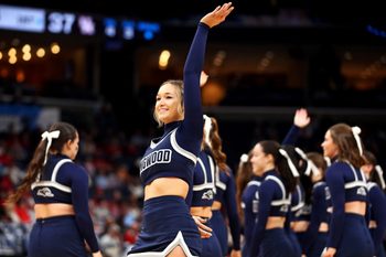 Mar 22, 2024; Memphis, TN, USA;  The Longwood Lancers cheerleaders cheer during a time out of the game between the Houston Cougars and the Longwood Lancers in the first round of the 2024 NCAA Tournament at FedExForum. Mandatory Credit: Petre Thomas-Imagn Images