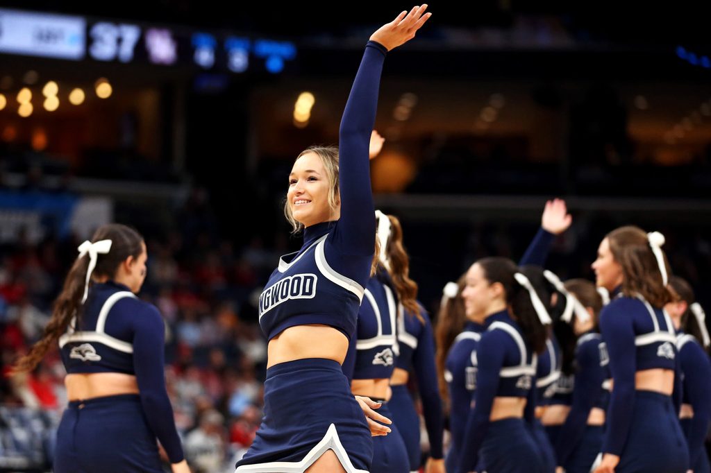 Mar 22, 2024; Memphis, TN, USA; The Longwood Lancers cheerleaders cheer during a time out of the game between the Houston Cougars and the Longwood Lancers in the first round of the 2024 NCAA Tournament at FedExForum. Mandatory Credit: Petre Thomas-Imagn Images