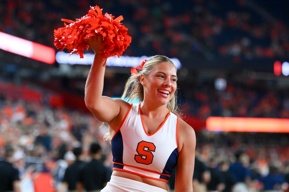 Sep 20, 2024; Syracuse, New York, USA; A Syracuse Orange cheerleader performs prior to a game against the Stanford Cardinal at the JMA Wireless Dome. Mandatory Credit: Rich Barnes-Imagn Images