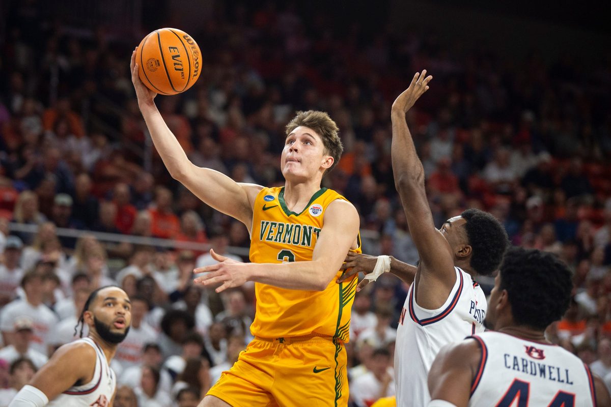 Vermont Catamounts guard TJ Hurley (3) goes up for a layup as Auburn Tigers take on Vermont Catamounts at Neville Arena in Auburn, Ala., on Wednesday, Nov. 6, 2024.
